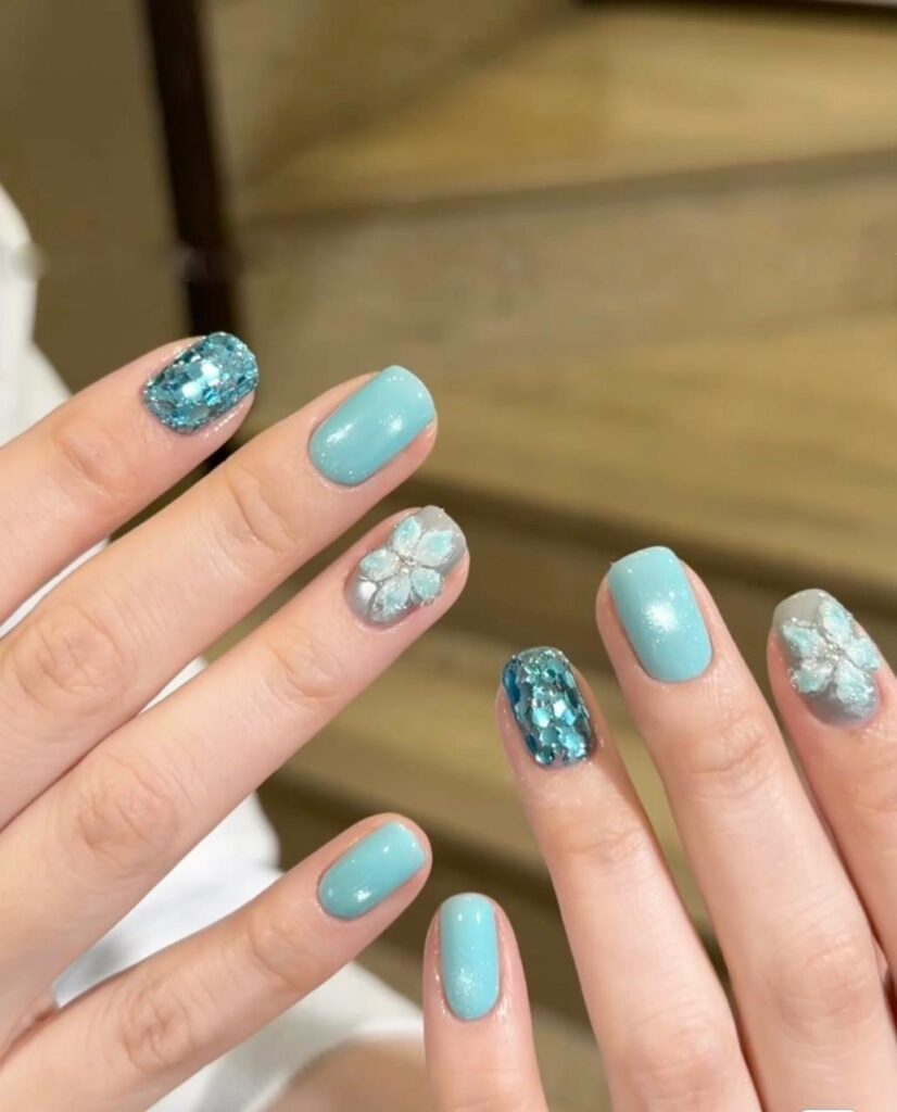 Teal nail art