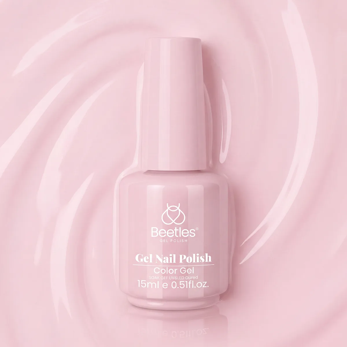 Beetles light pink gel polish colour gel bottle standing in a swirl of pink gel