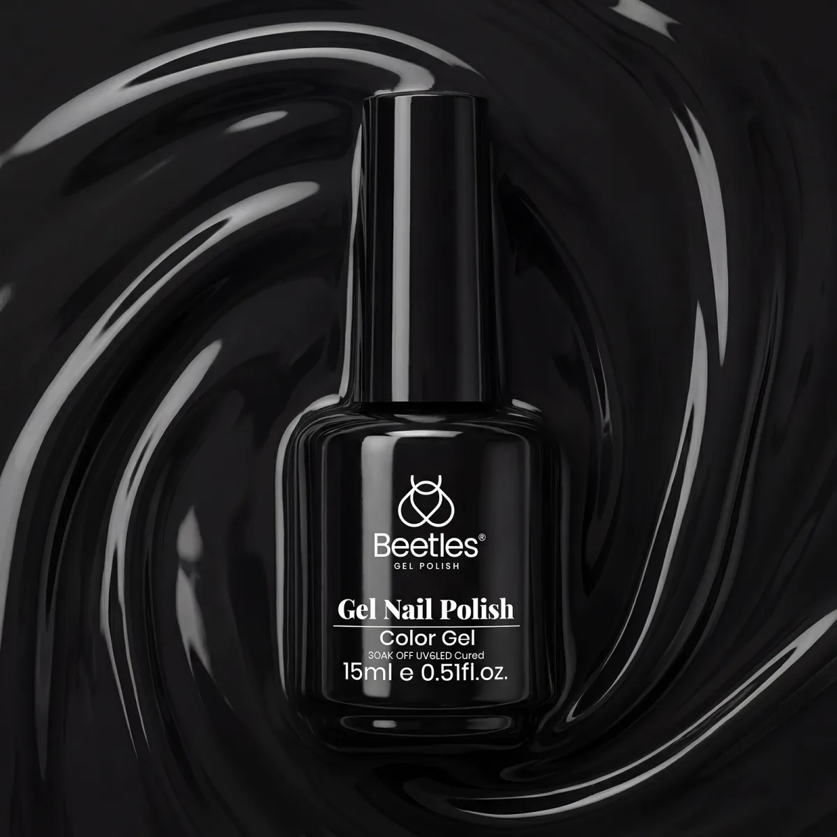 Beetles black gel nail polish bottle standing in a swirl of black gel