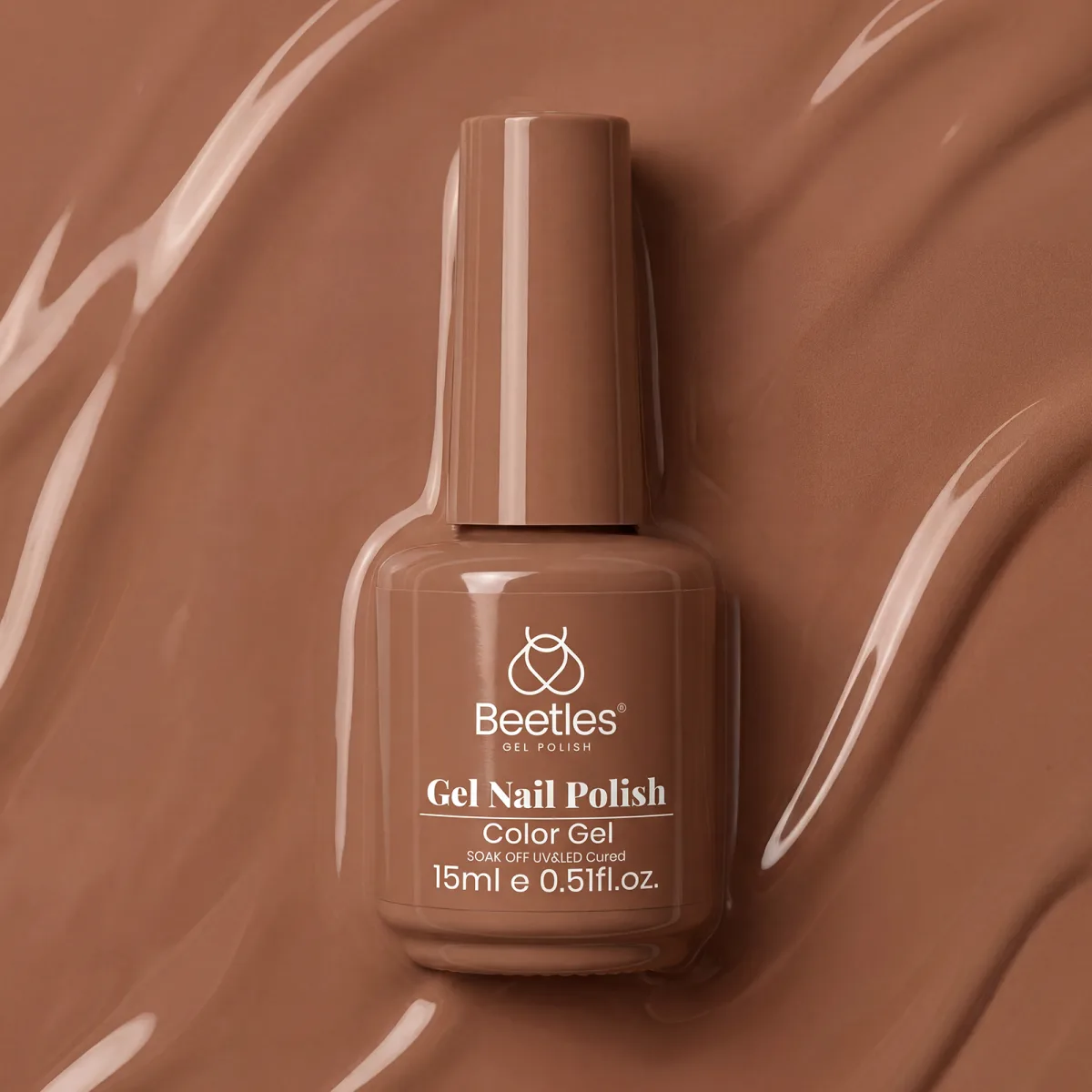 Beetles Beyonce Caramel color gel bottle on a caramel gel swirl background