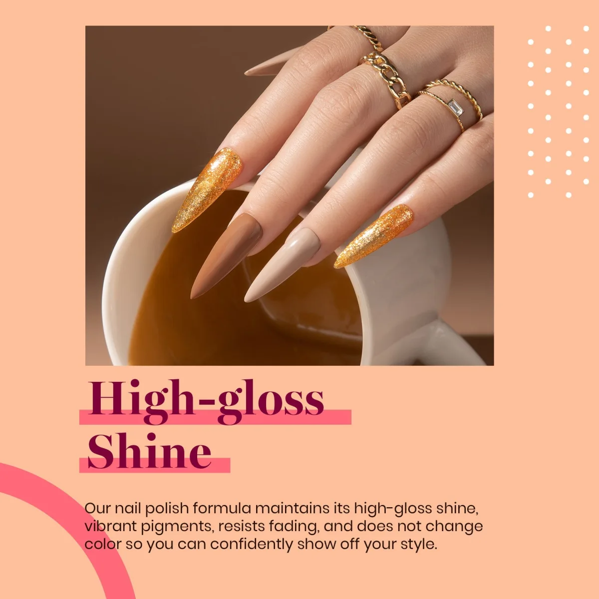 Long pointed nails in caramel, nude and gold glitter over a coffee mug