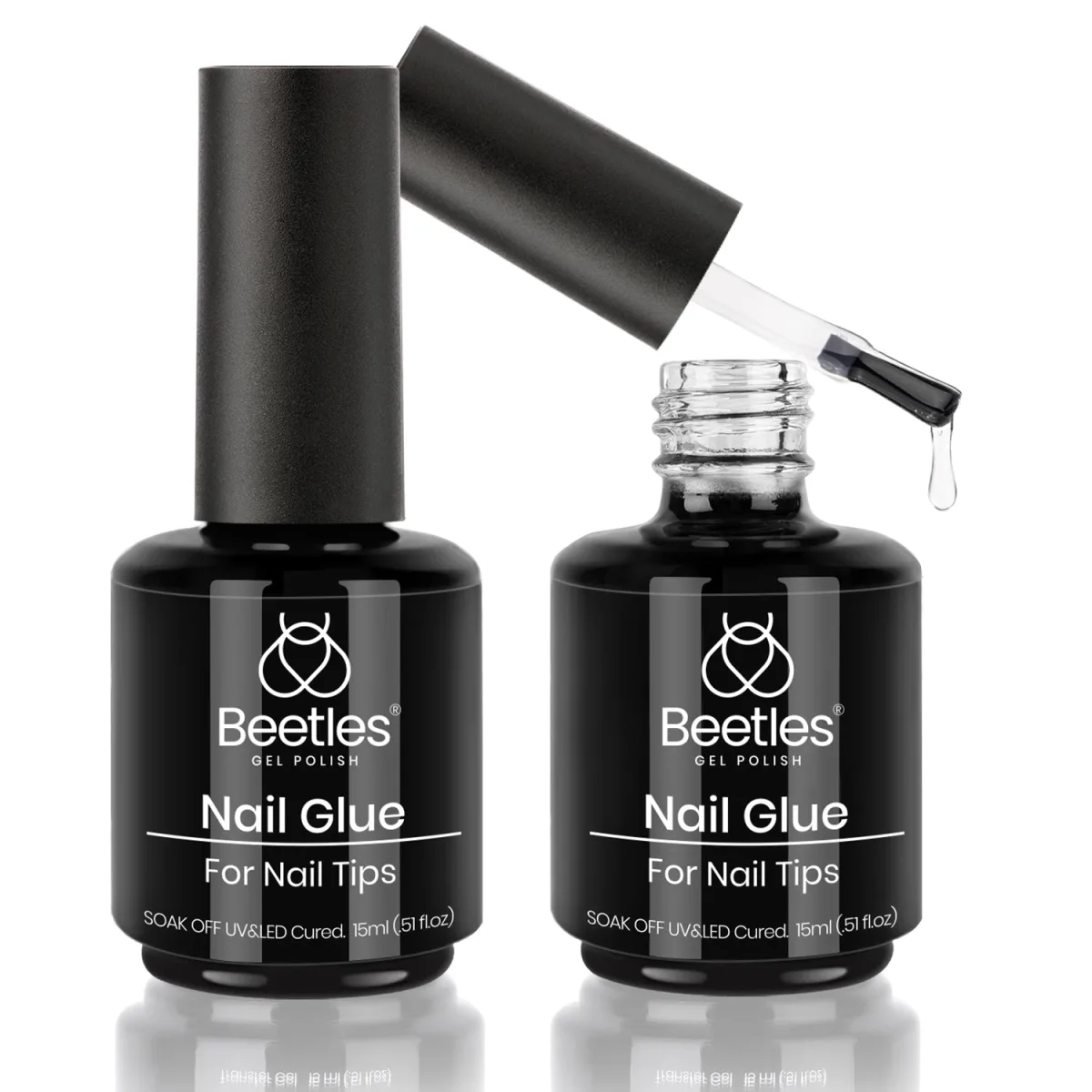 Two Beetles nail glue for nail tips bottles, one open with brush and a clear drip